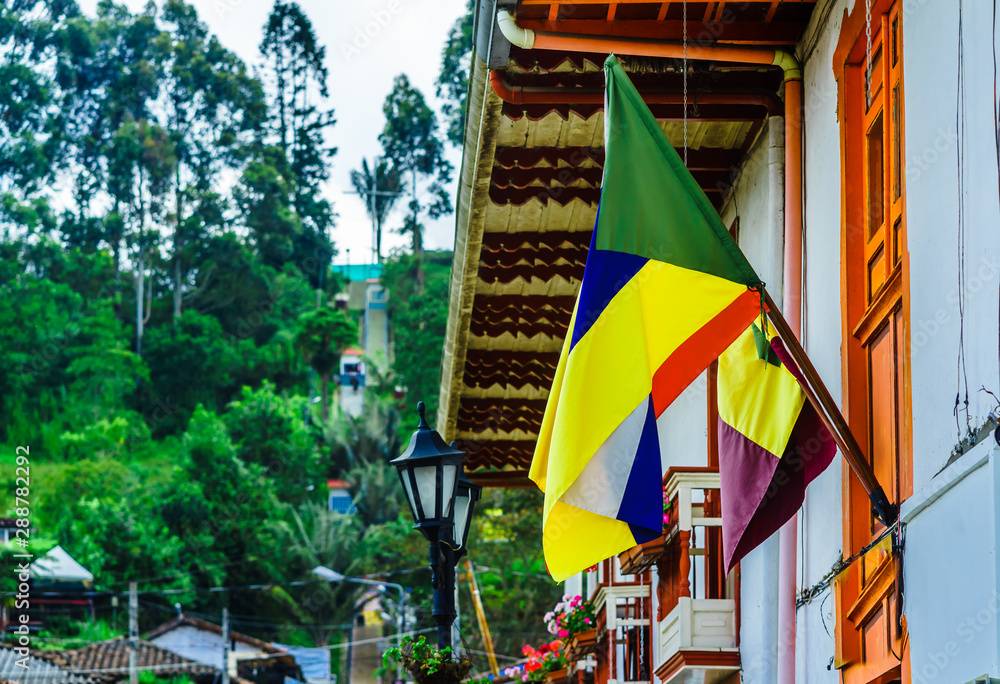View on colombian flag in the old town of Colombia