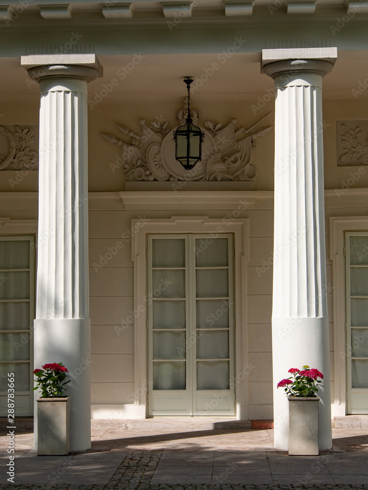Naklejka premium Part of the facade of a neoclassical building with columns.