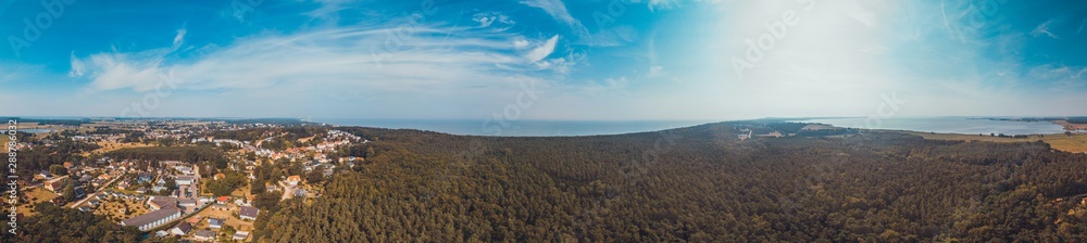 giant panorama at baltic sea with forest and some villages