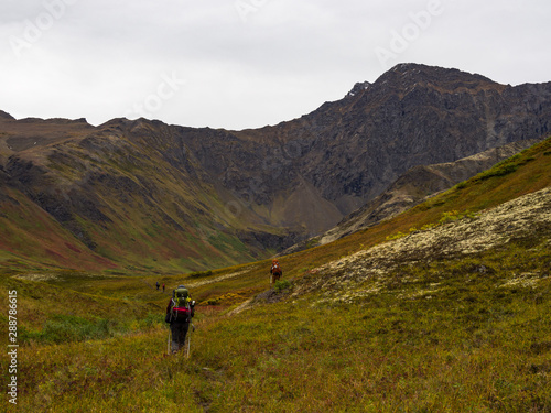 Backpackers Hiking in Alaska, Autumn Tundra, Chugach State Park © Jonathan
