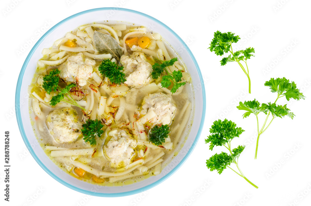 Chicken broth with egg noodles and meatballs. Chicken broth with egg noodles and meatballs.