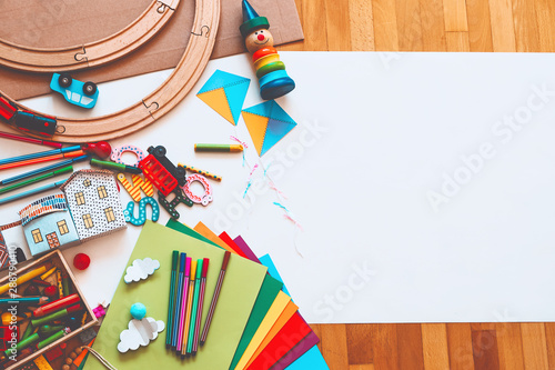 Kindergarten or preschool background. Art child frame with empty paper. photo