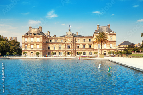 26 July 2019, Paris, France: Luxembourg Palace in The Jardin du Luxembourg. View with pond with small boats