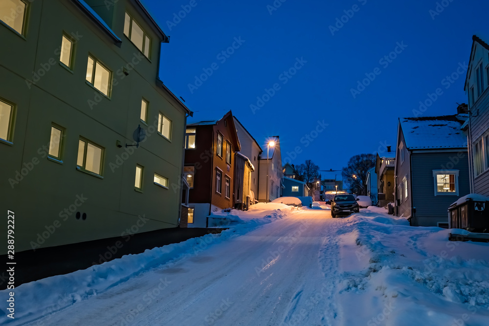 Snow covered residential sroad in Tromso