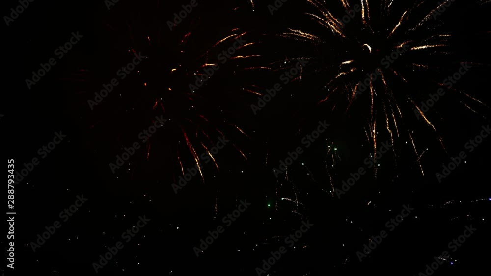 Beautiful, magnificent, red, silver and gold color of dazzling fireworks. Real firework of different colors and shapes. Ultra HD. 4K footage Beautiful, magnificent, red, silver and gold color of dazzling fireworks. Real firework of different colors and shapes. Ultra HD. 4K footage