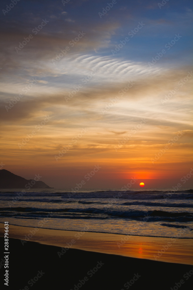 Sunrise in a beach of Ubatuba, Sao Paulo, Brazil