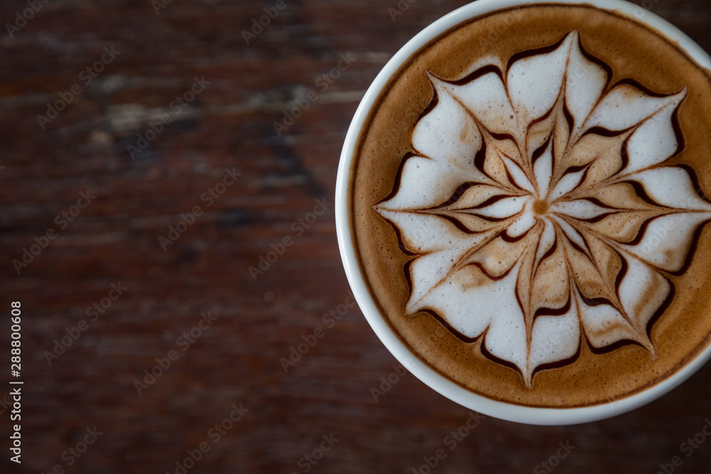 Cup of coffee with latte art on top Cup of coffee with latte art on top