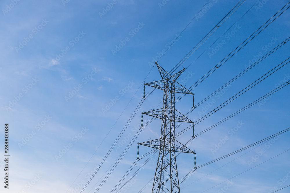 High voltage post tower with blue sky