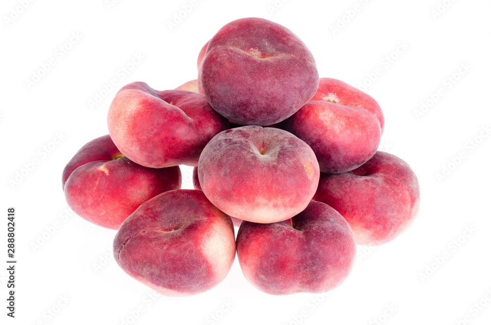 Heap of sweet paraguaya peaches isolated on white background