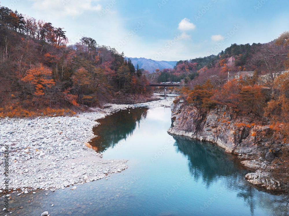 Shogawa river at Japanese Shirakawa-go village in autumn