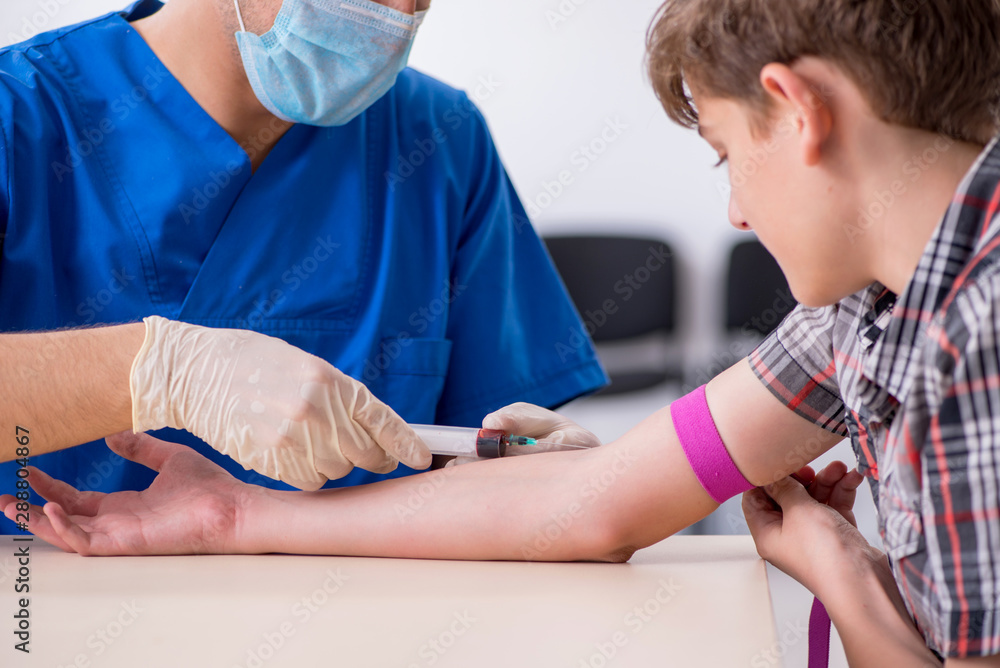 Young boy visiting doctor in hospital Young boy visiting doctor in hospital