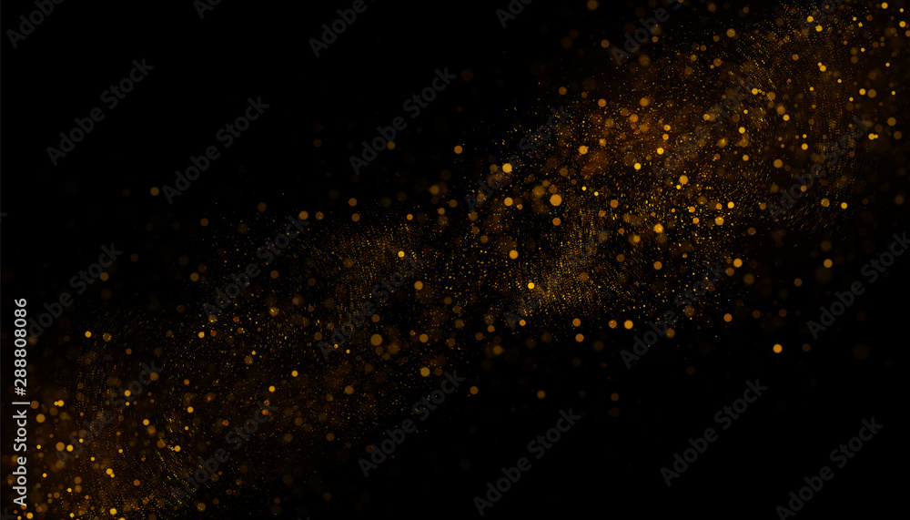 Golden glitter dust on black background