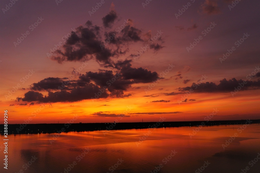sunset over the sea, sunset, sky, sea, water, sun, sunrise, clouds, nature, landscape, cloud, red, horizon, orange, dusk, beautiful, sunlight, reflection, summer, sundown, cloudscape, lake, river
