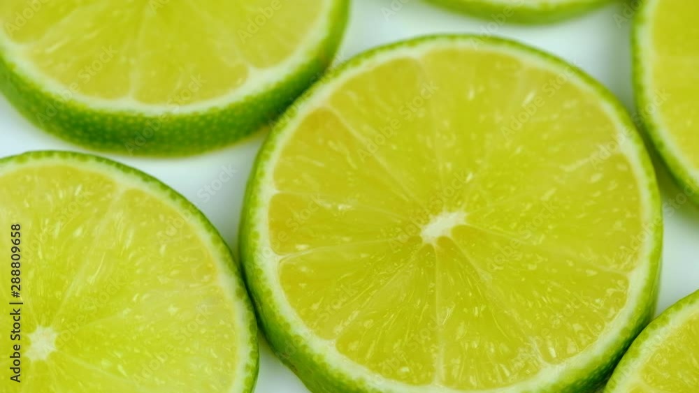 green lemons slice  on white background.