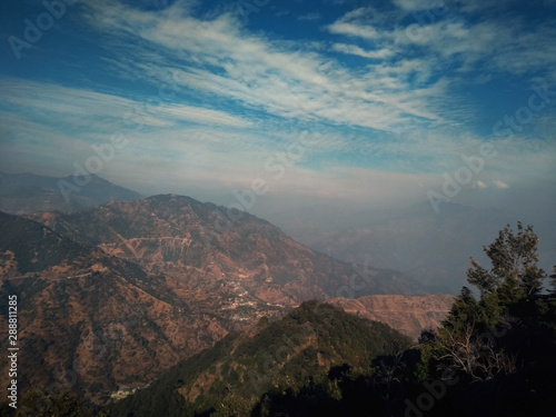 Clouds hovering over mountains © Ayush