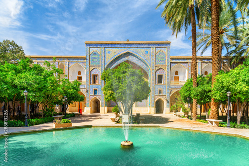 Awesome fountain in the middle of traditional Persian courtyard