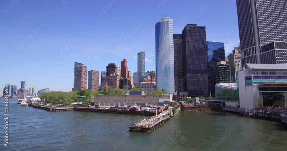 Arriving to a ferry terminal in Lower Manhattan, New York at daytime. Arriving to a ferry terminal in Lower Manhattan, New York at daytime.