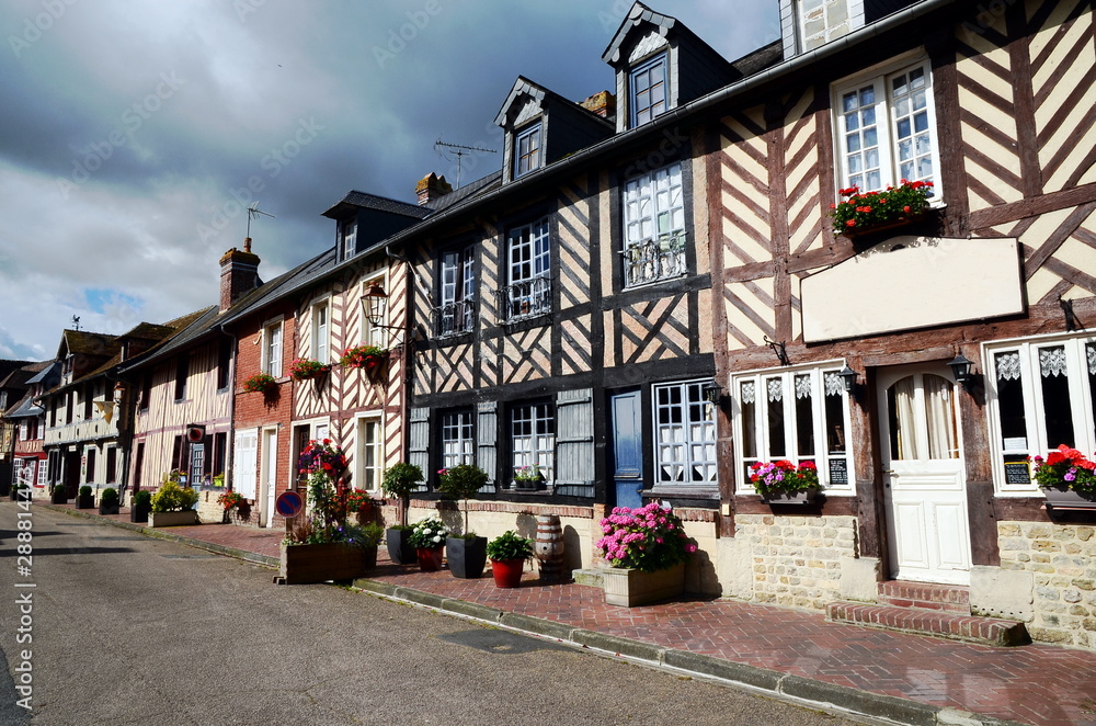 Beuvron-en-Auge is an achetpical small beautiful village in Normandy, France well-knowm by its half-timbered buildings.