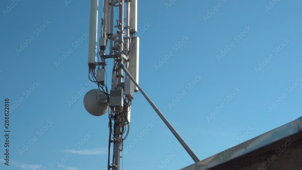 Close-up of a cell tower antenna for 3G, 4G or 5G wireless mobile networks and telecommunications Internet connection. Cellular technology. Close-up of a cell tower antenna for 3G, 4G or 5G wireless mobile networks and telecommunications Internet connection. Cellular technology.
