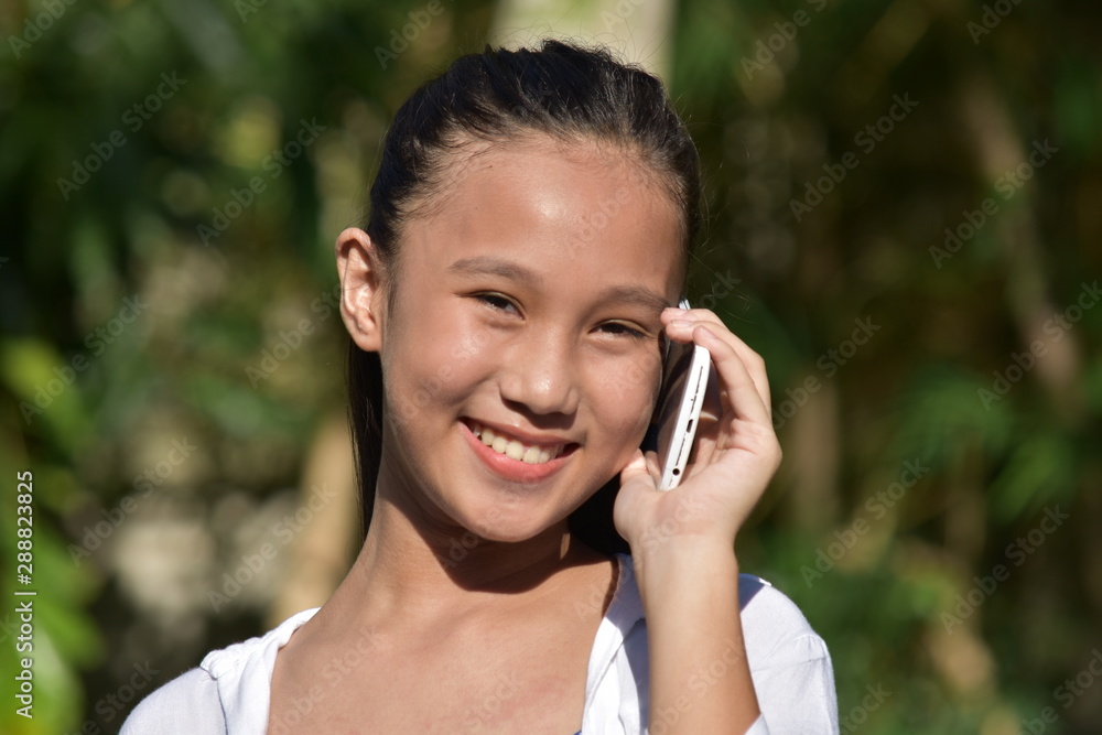 Youngster Using Cell Phone And Happy Youngster Using Cell Phone And Happy