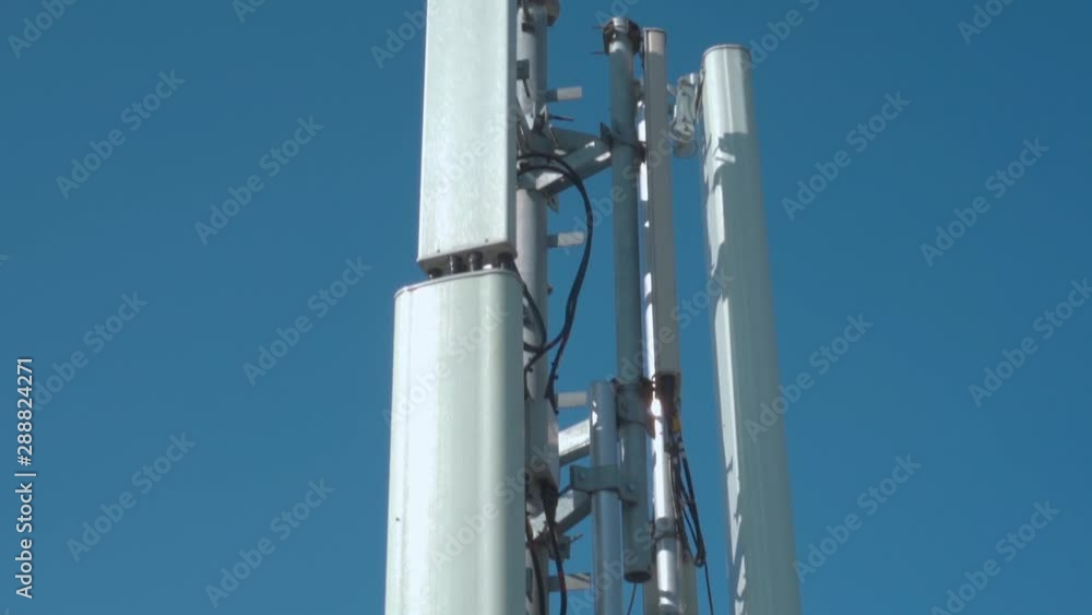 Close-up of a cell tower antenna for 3G, 4G or 5G wireless mobile networks and telecommunications Internet connection. Cellular technology. Close-up of a cell tower antenna for 3G, 4G or 5G wireless mobile networks and telecommunications Internet connection. Cellular technology.