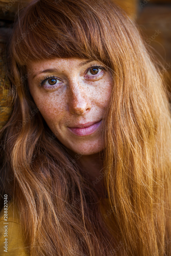 Portrait close up of young red-hair woman Portrait close up of young red-hair woman