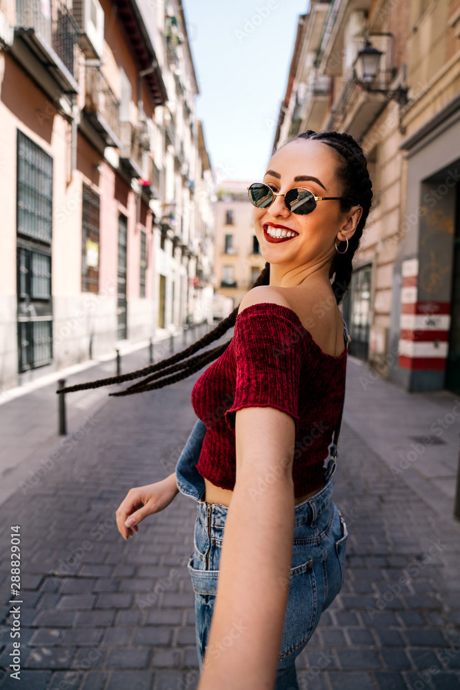 Woman looking at camera smiling Woman looking at camera smiling