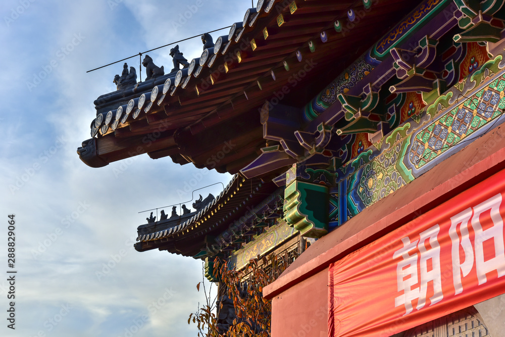 Fototapeta premium Tangshan City, Hebei Province, China - November 7, 2018. Close-up of Chinese ancient buildings, temple buildings and internal statues