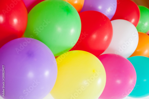 Colorful party festive floating balloons on background