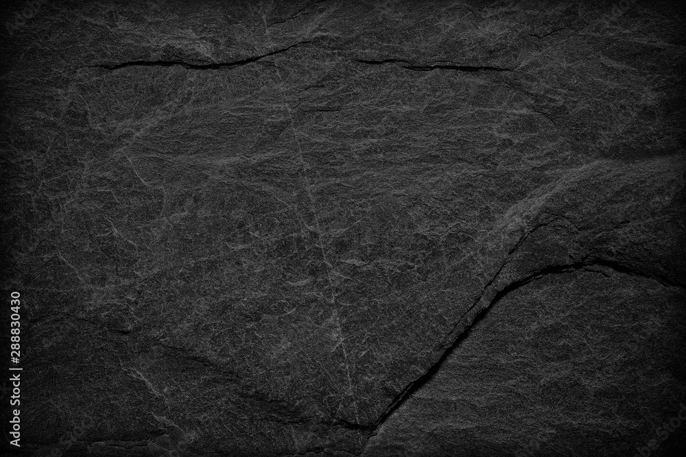 Dark grey black slate background or texture. black stone Dark grey black slate background or texture. black stone