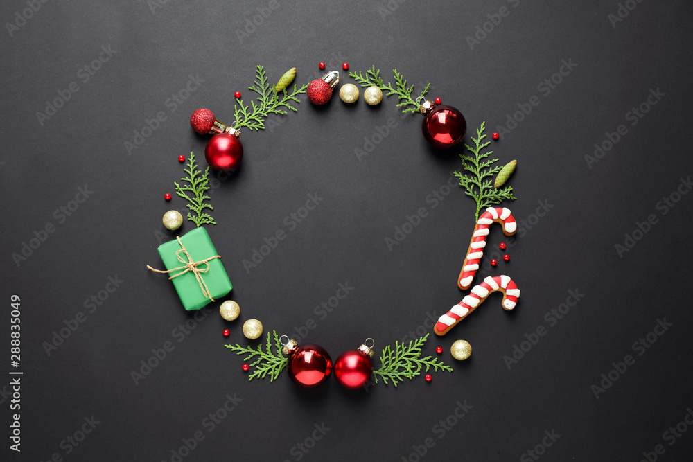 Flat lay composition with Christmas decorations on dark background, space for text Flat lay composition with Christmas decorations on dark background, space for text