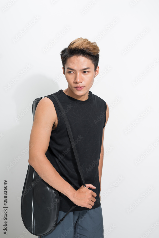 Asian badminton player with bag on white background Asian badminton player with bag on white background