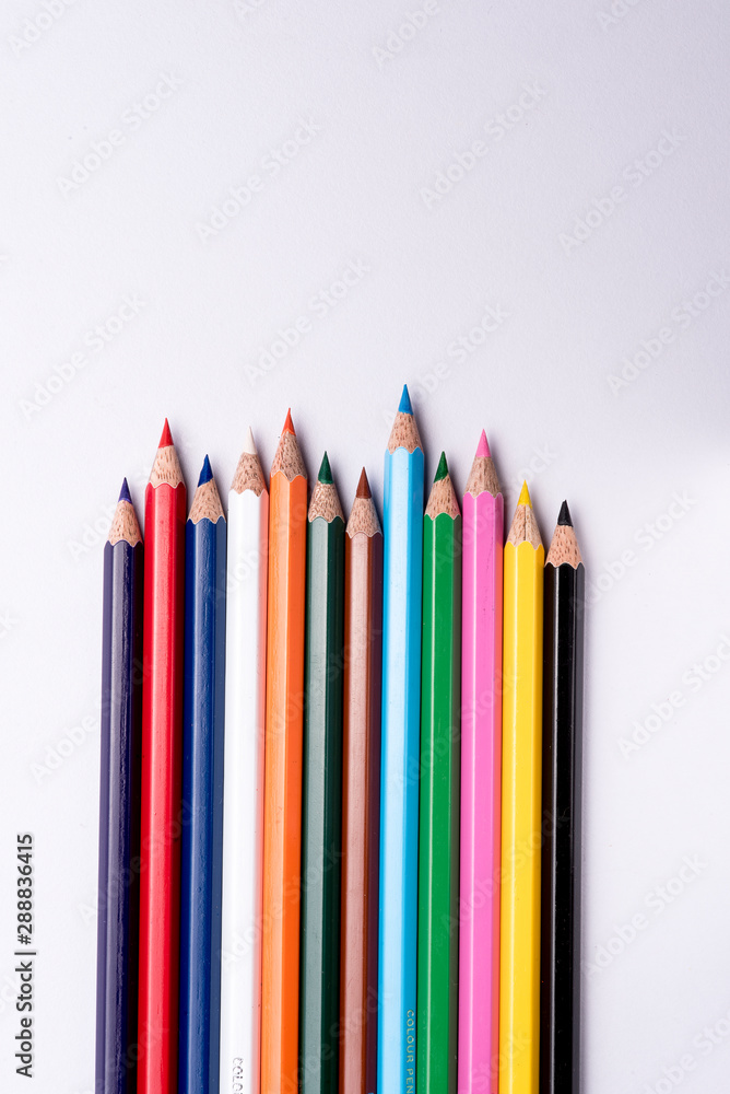 Color pencils arranged on a isolated white background. Color pencils arranged on a isolated white background.