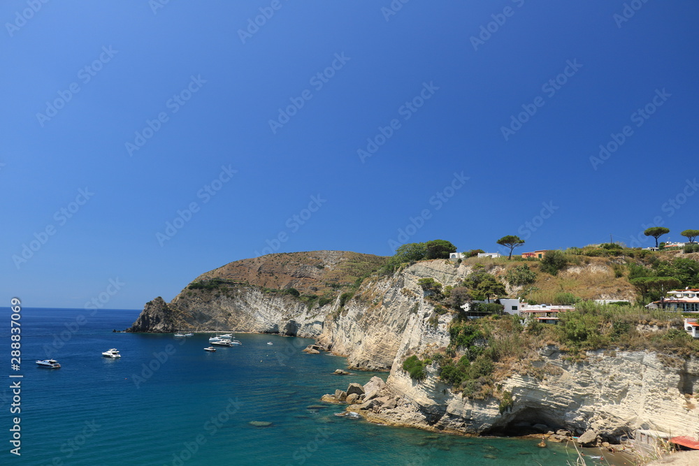 Mediterranean sea with yacht and cliff. Natural panorama of the