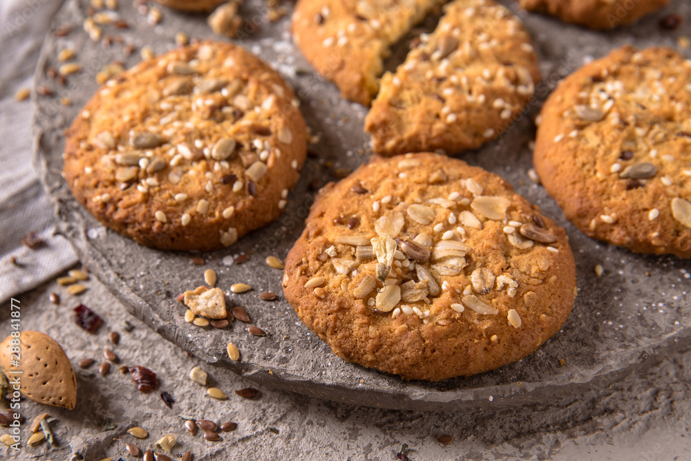 Dietary fitness biscuit without sugar with sunflower seeds, flax and sesame. Crispy and crumbly delicious cookies with natural ingredients: flour, nuts, seeds, pieces of chocolate, cocoa