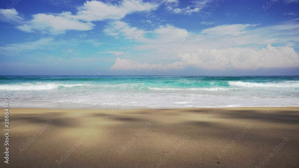 Tropical beach wave and sand and rocks with summer blue sky. Tropical beach wave and sand and rocks with summer blue sky.