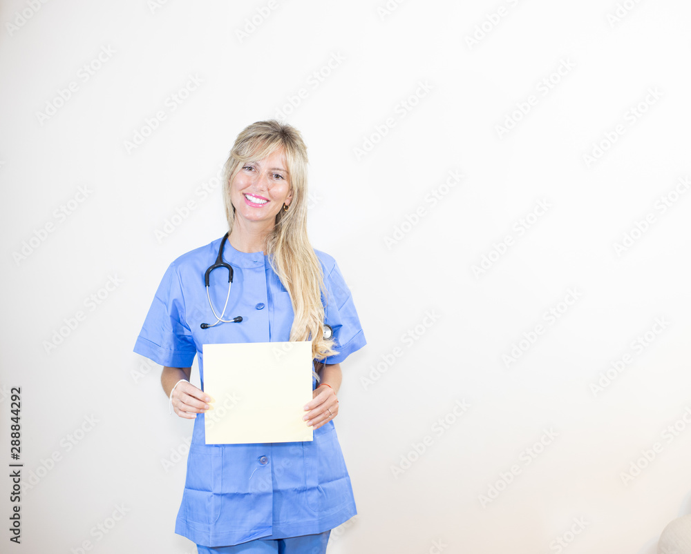 female doctor with uniform and stethoscope and blank signboard female doctor with uniform and stethoscope and blank signboard