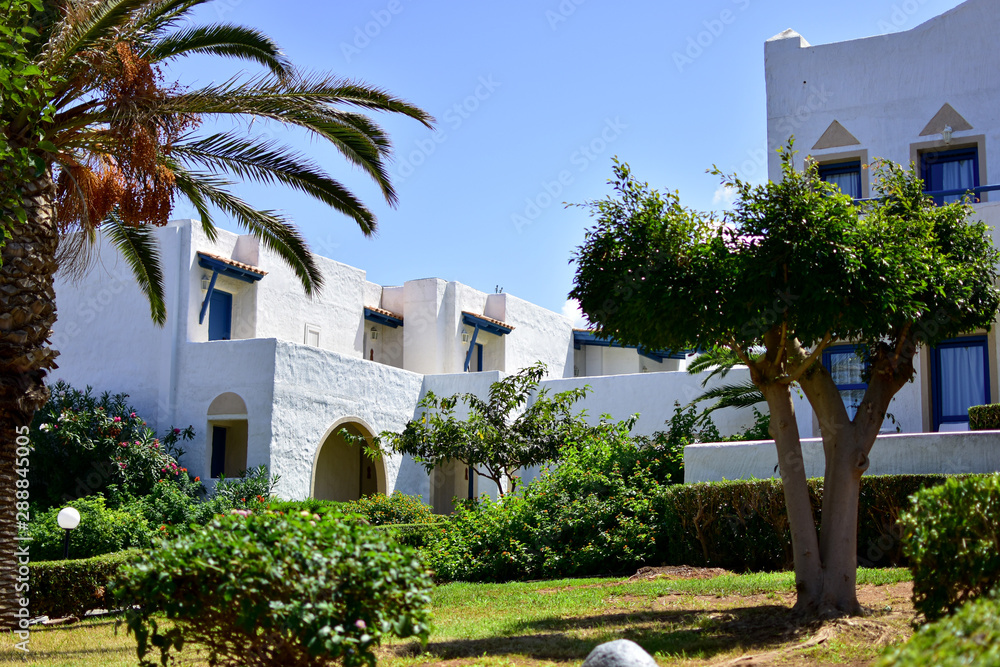 Beautiful white houses of classic Greek architecture on the island of Crete.