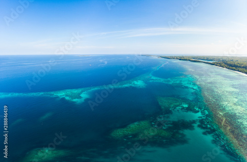 Aerial view tropical beach island reef caribbean sea at Pasir Panjang  Kei Islands  Indonesia Moluccas archipelago. Top travel destination  best diving snorkeling  stunning panorama.