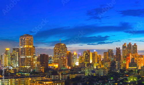 Panorama of modern high building of bangkok business city center at twilight. Picture for add text message. Backdrop for design art work.