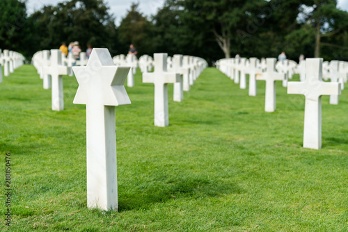view of Christian and Jewish headstones in the American Cemetery at Omaha Beach in Normandy