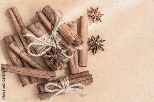 Cinnamon sticks close up on rustic background. Christmas time.