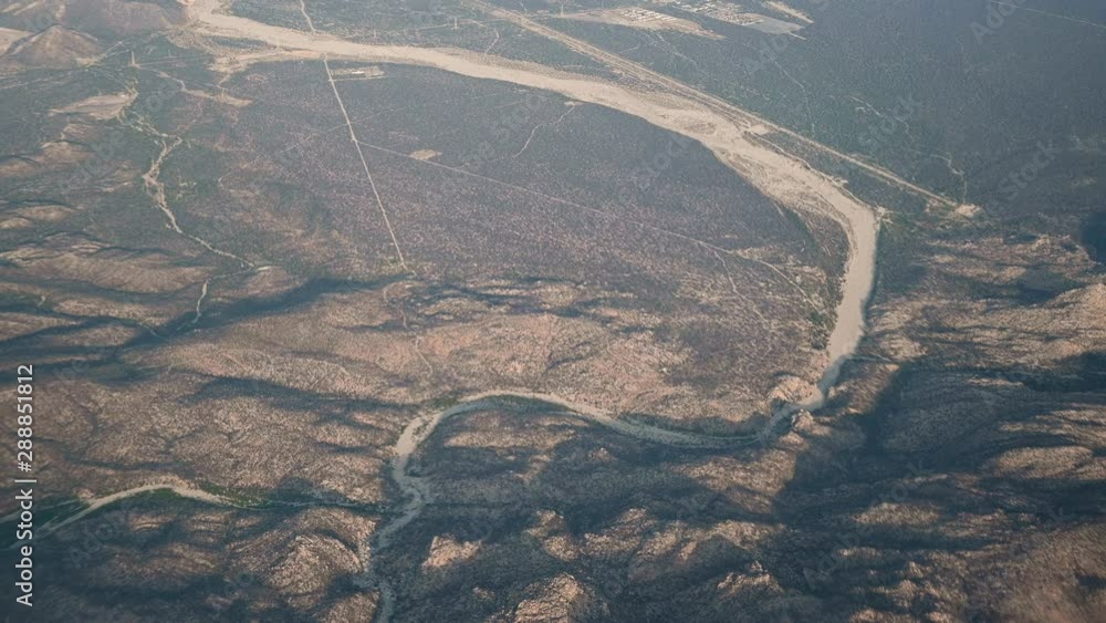 Aerial view of the mountains and fields of the Baja California Peninsula in Mexico. Aerial view of the mountains and fields of the Baja California Peninsula in Mexico.
