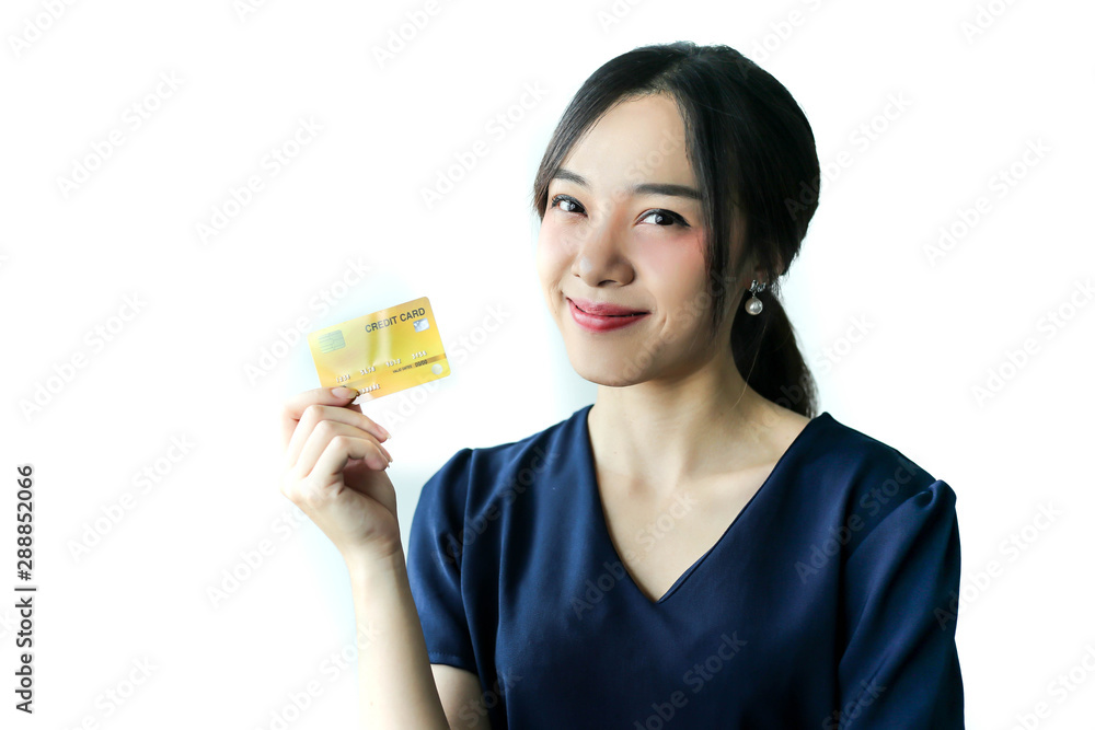Portrait Asia smiling woman with credit card in hand,happy to have money concept. Portrait Asia smiling woman with credit card in hand,happy to have money concept.