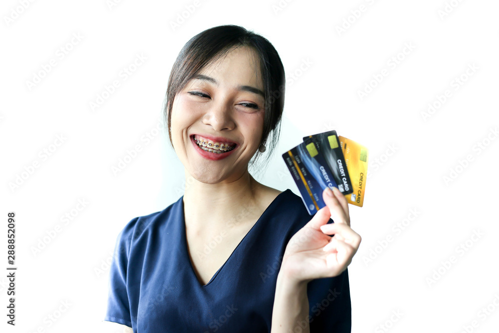 Portrait Asia smiling woman with credit card in hand,happy to have money concept. Portrait Asia smiling woman with credit card in hand,happy to have money concept.