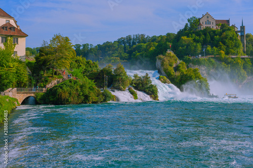 The Rhine Falls near the city Schaffhausen in Switzerland. Globally considered a rather small waterfall, but still attraction for tourists from all over the world.