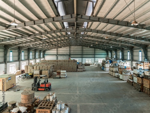 Interior shot of a warehouse with forklifts