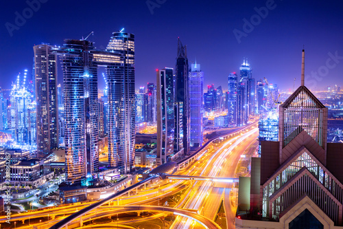 Amazing skyline cityscape with illuminated skyscrapers. Downtown of Dubai at night  United Arab Emirates.