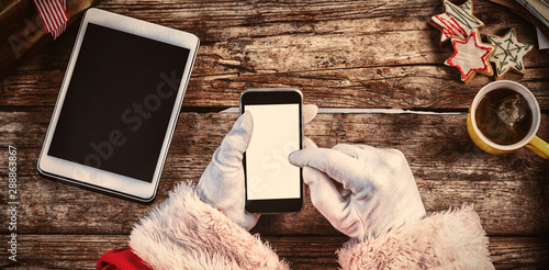 Santa claus using mobile phone 