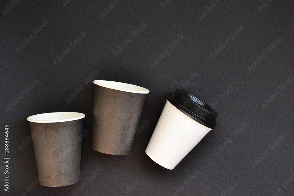 Design concept of mockup coffee cup set and lid set on white background. Copy space for text and logo Design concept of mockup coffee cup set and lid set on white background. Copy space for text and logo